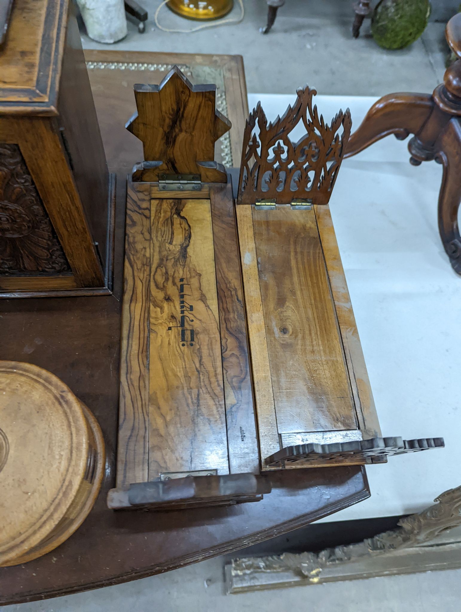 A Victorian oak smoker's box, two olive wood book rests, money box, tray, clock and a cutlery box and another